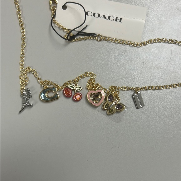 Coach Gold Charm Necklace - Picture 2 of 4